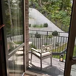 Апартаменты New Cozy Designer In Uzupis Walk To Old Town In A Luxury Building Garden View Balcony